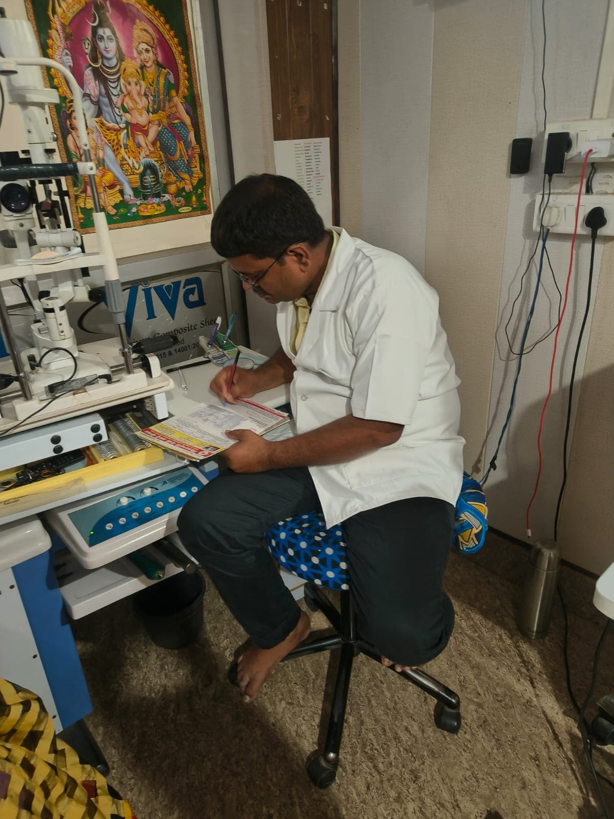 Clinician reviewing patient information in the examination room